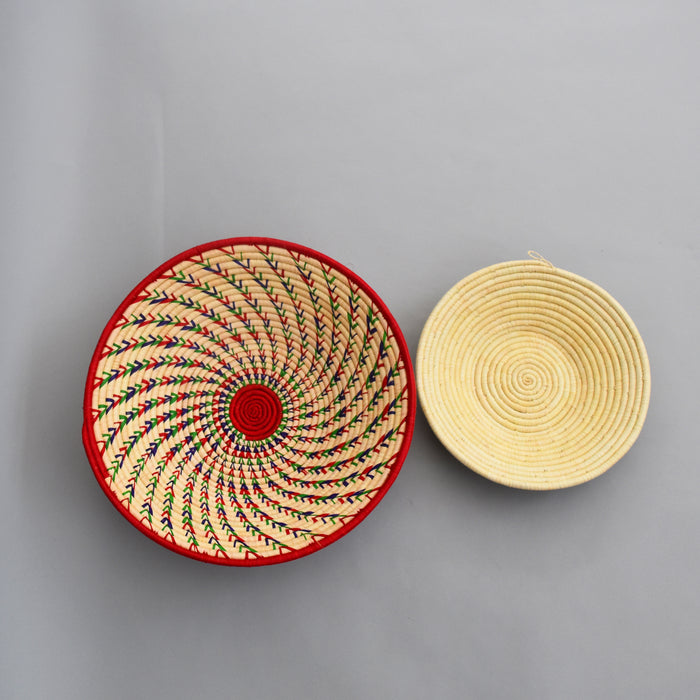 Hand woven straw. A tradition and art which has been part of Ugandan culture for centuries.  With all of the materials used being natural products or recycled, we also believe this is a lovely way of making use of natural resources the world has to offer and making positive changes to become more sustainable.  Beautifully, unique, handmade basket made out of banana stalks and raffia fibres also known as the Ugandan basket.