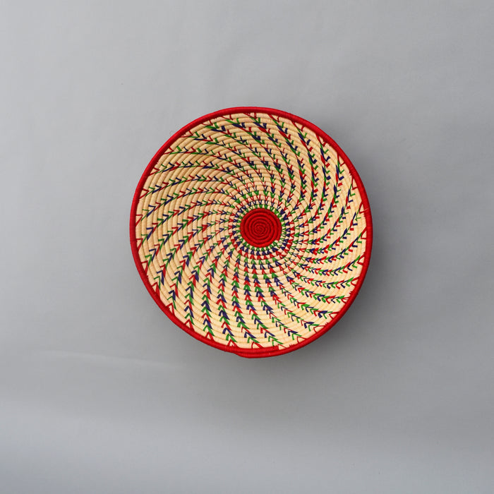 Hand woven straw. A tradition and art which has been part of Ugandan culture for centuries.  With all of the materials used being natural products or recycled, we also believe this is a lovely way of making use of natural resources the world has to offer and making positive changes to become more sustainable.  Beautifully, unique, handmade basket made out of banana stalks and raffia fibres also known as the Ugandan basket.