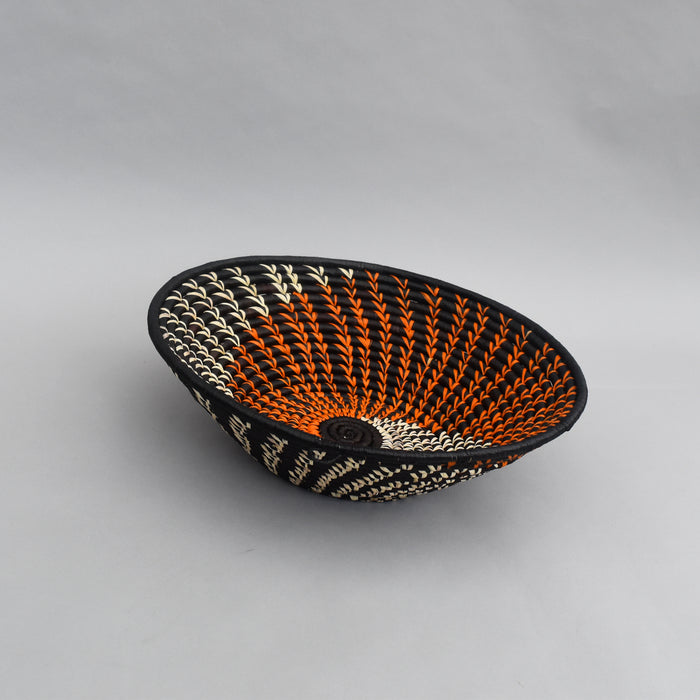 Hand woven straw. A tradition and art which has been part of Ugandan culture for centuries.  With all of the materials used being natural products or recycled, we also believe this is a lovely way of making use of natural resources the world has to offer and making positive changes to become more sustainable.  Beautifully, unique, handmade basket made out of banana stalks and raffia fibres also known as the Ugandan basket.
