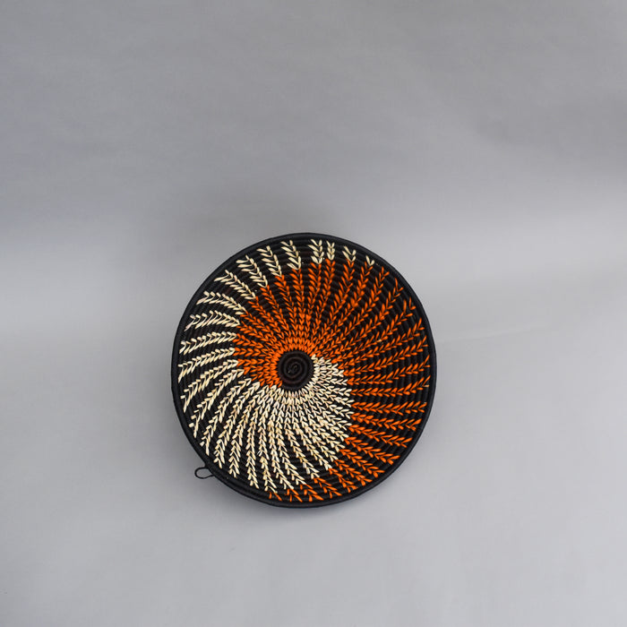 Hand woven straw. A tradition and art which has been part of Ugandan culture for centuries.  With all of the materials used being natural products or recycled, we also believe this is a lovely way of making use of natural resources the world has to offer and making positive changes to become more sustainable.  Beautifully, unique, handmade basket made out of banana stalks and raffia fibres also known as the Ugandan basket.