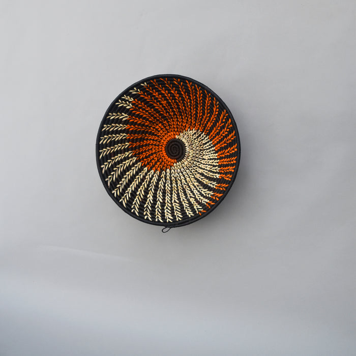 Hand woven straw. A tradition and art which has been part of Ugandan culture for centuries.  With all of the materials used being natural products or recycled, we also believe this is a lovely way of making use of natural resources the world has to offer and making positive changes to become more sustainable.  Beautifully, unique, handmade basket made out of banana stalks and raffia fibres also known as the Ugandan basket.