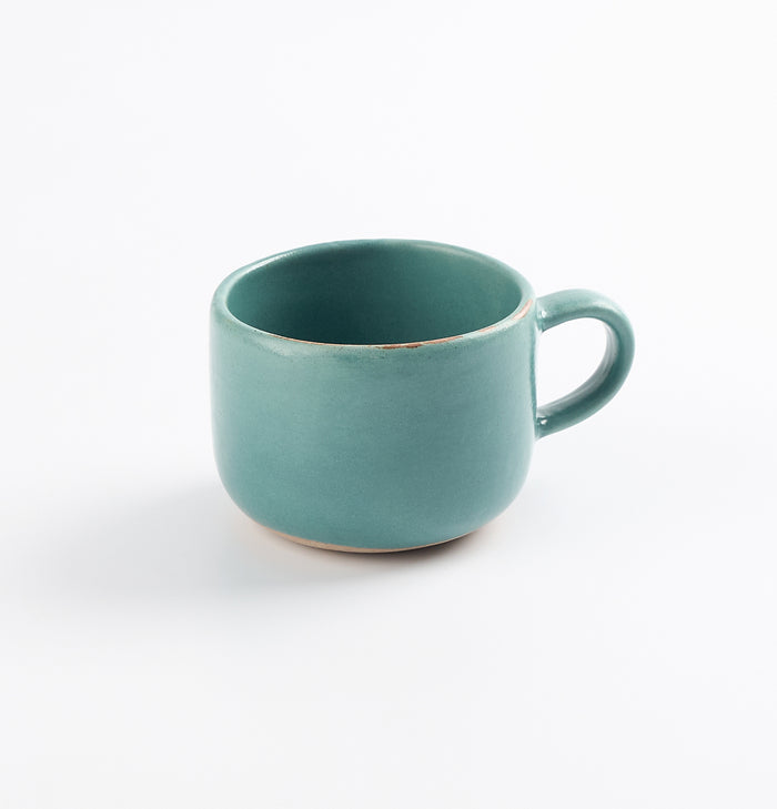 Palinopsia Ceramics antique looking teal blue mug on white background