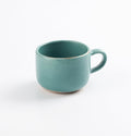 Palinopsia Ceramics antique looking teal blue mug on white background