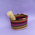 The perfect fair-trade accessory you need for your bike to help carry items freely, be it a little shopping or bits and bubs. It comes with a faux leather strap so that it can be fitted on the bike. It’s colorful, stylish and most importantly eco-friendly and It doesn’t matter if it gets wet. All you need to do is dry it in airy place. It is easy to strap and unstrap onto the bike as and when needed.  The basket is made of Elephant grass in Bogla, Ghana. It is environmentally friendly, 100% degradable, and