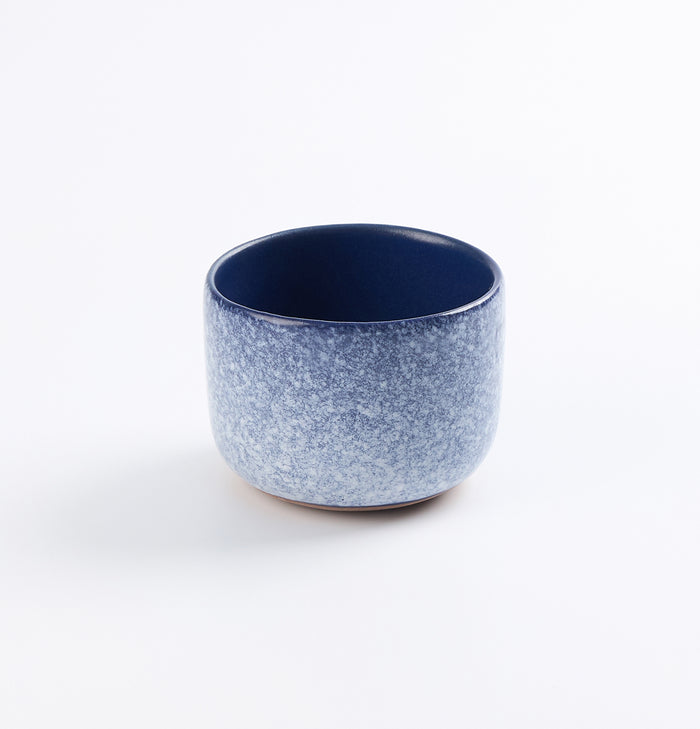 Palinopsia ceramic midnight blue and white blizzard handmade cup on white background