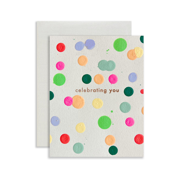 Celebrating You handmade artisanal greeting card with bright polka dots on a white background