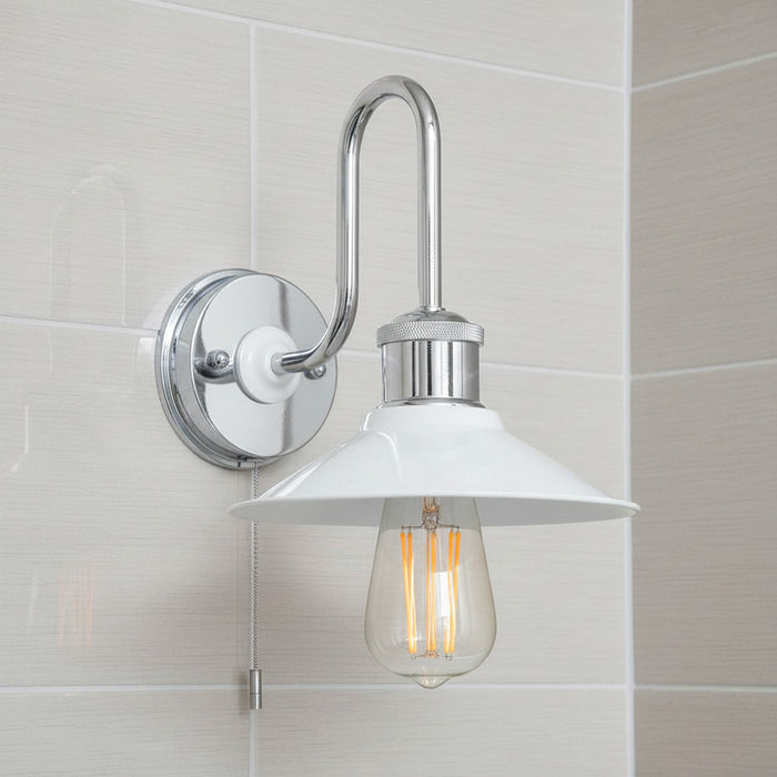 bathroom wall light with pull switch mounted on bathroom wall tiles