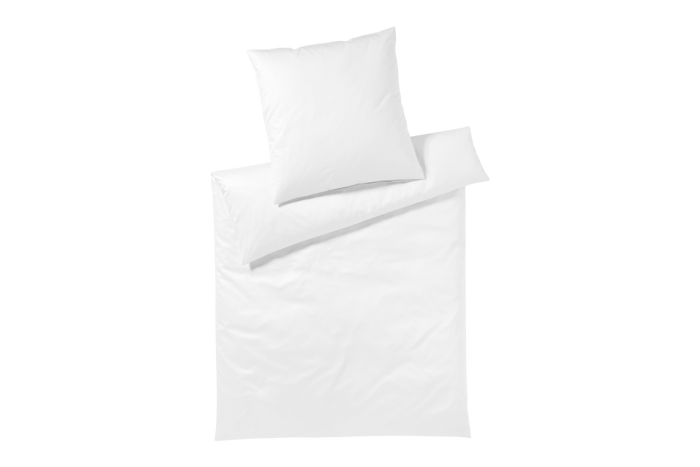 White bedding set with duvet and pillow on a white background