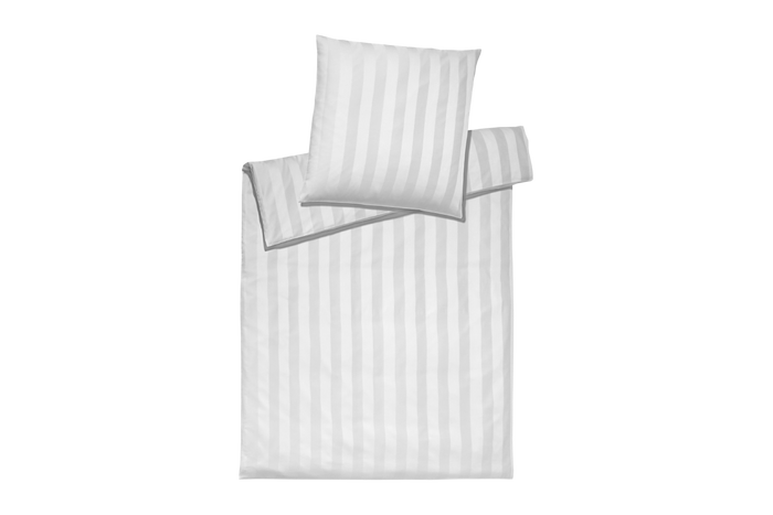 Striped bedding set with a pillow on a white background