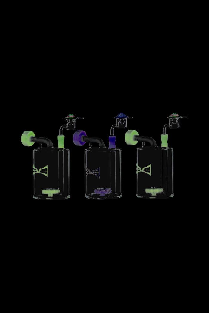 Front view of the Evolution Money Jar Dab Rig with Banger and Carb Cap, showing its compact size and clear glass construction.