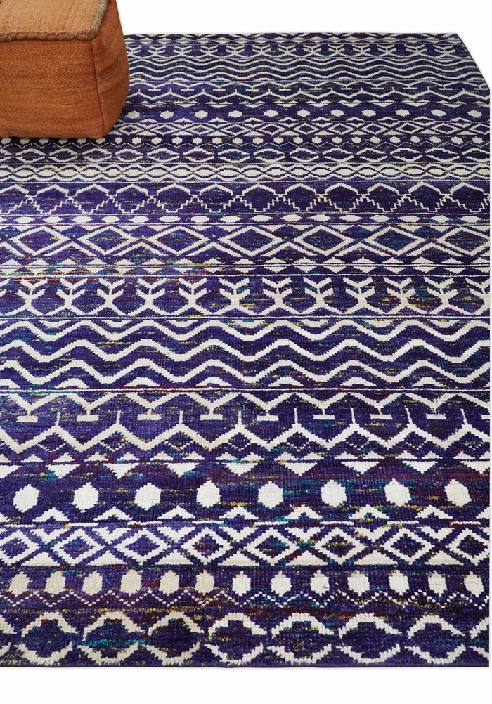 Hand-knotted recycled silk area rug with navy and white geometric trellis pattern