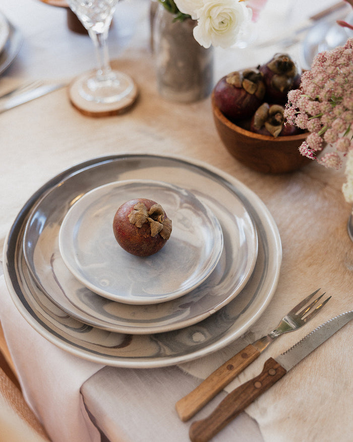 Three piece ceramic stoneware dinner set in a marble abstract design
