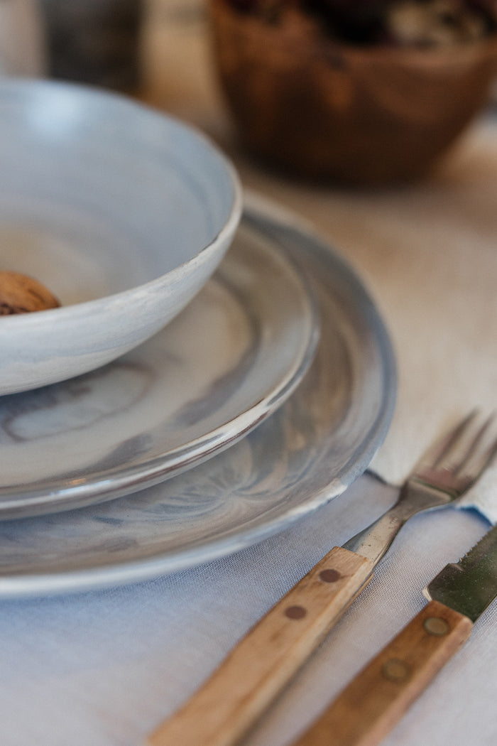 Three piece ceramic stoneware dinner set in a marble abstract design