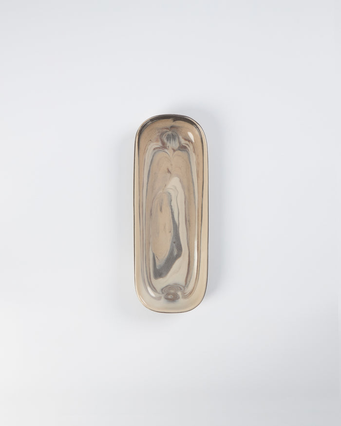 Ceramic Mezze plate with abstract marble design on a white background