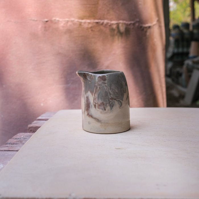 hand pourer pitcher with marbled design