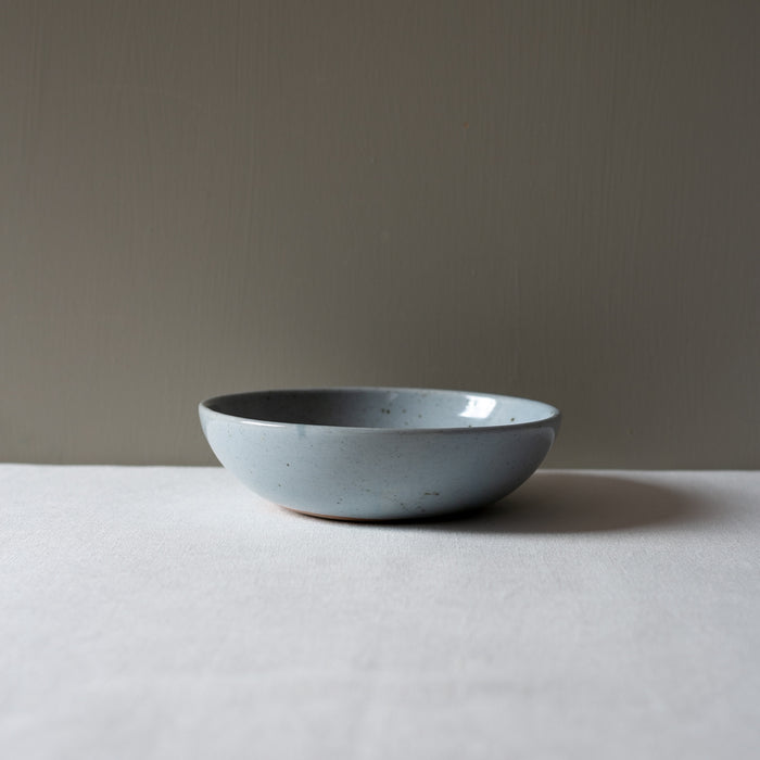 side view of Palinopsia's Ceramics handmade blue speckle breakfast bowl