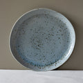 Large round handmade dinner plate classic shape in a blue grey colour with speckles