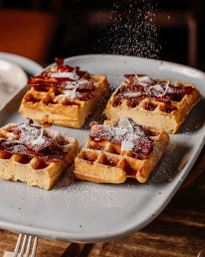Maya ceramic rectangle platter with golden waffles and icing sugar at Autumn Rooms on Darby Street