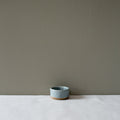 Side view of a small ramekin salt pinch bowl by Palinopsia Ceramicss