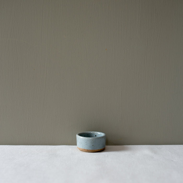 Side view of a small ramekin salt pinch bowl by Palinopsia Ceramicss