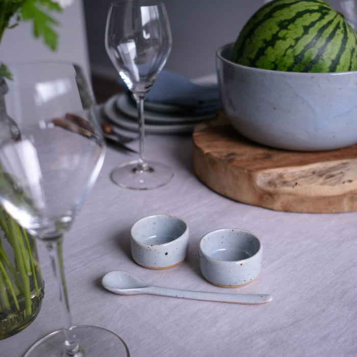 handmade salt and paper dishes in blue and grey speckle