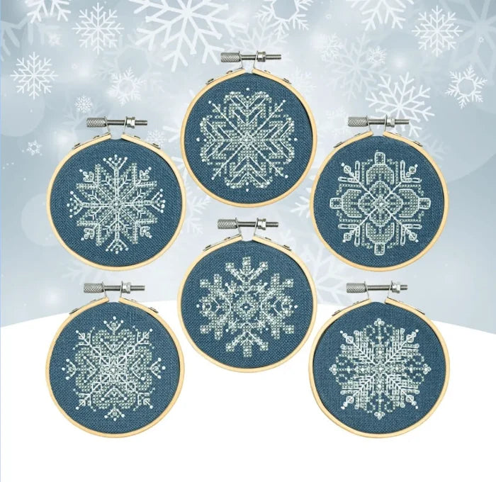 Mini Snowflake Ornaments Cross Stitch Pattern by Counting Puddles - Sewfinity.com