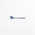 Ceramic teaspoon with marbled abstract design in cobalt blue and white by Palinopsia