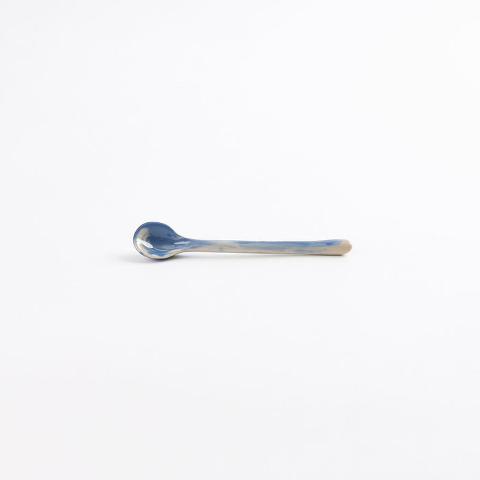Ceramic teaspoon with marbled abstract design in cobalt blue and white by Palinopsia