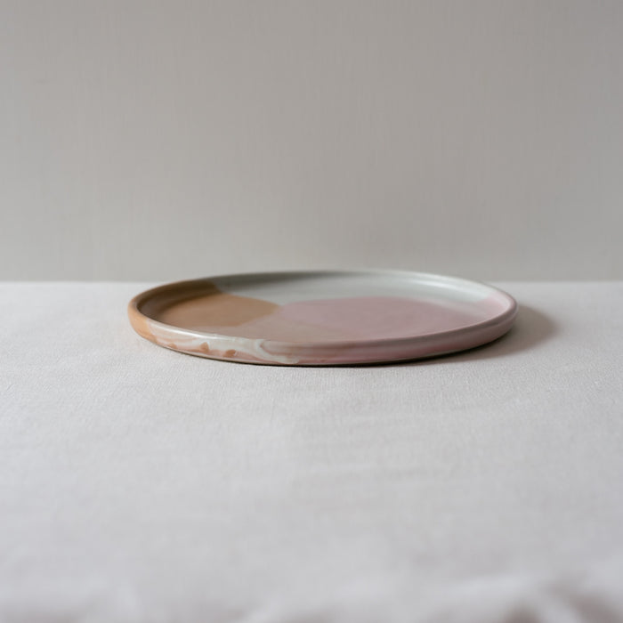 Handmade dinner plate by Palinopsia Ceramics in pink, brown and white