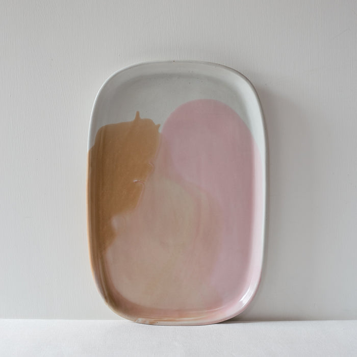 Joyful, fun and colourful ceramic serving platter by Palinopsia Ceramics in pink, brown and white ice cream inspired colours