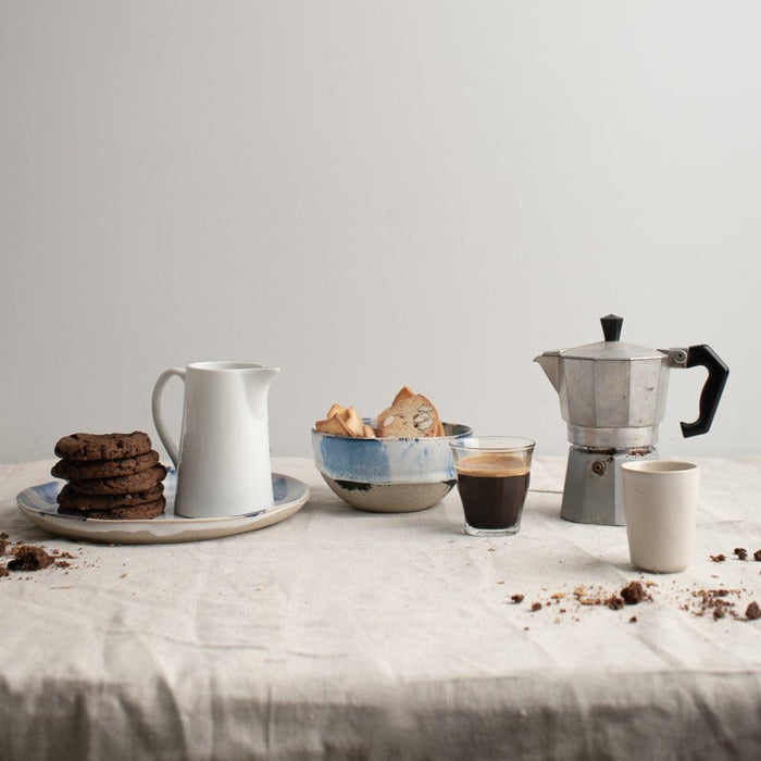 Breakfast table with biscotti, Italian coffee and handmade ceramics in blue and white by Palinopsia Australia