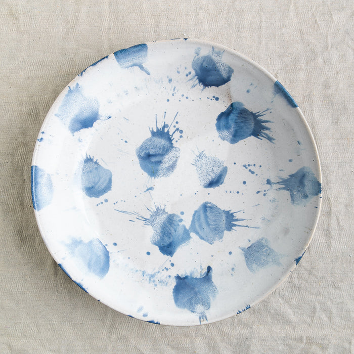 Bird's-eye view of the blue and white glaze design on a handmade serving bowl by Palinopsia Ceramics
