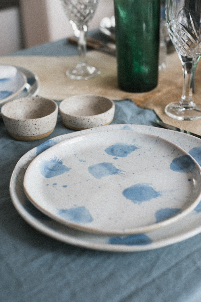 Handmade ceramics on a dining table by Palinopsia Ceramics in Newcastle