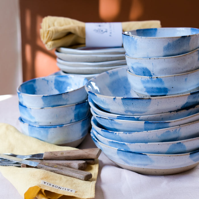 Six stacked Handmade Pollock Pasta bowls in blue and white by Palinopsia Ceramics