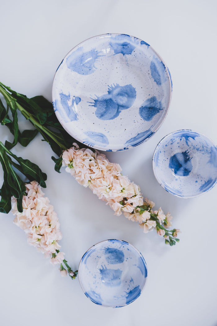 Blue and white pasta bowls in Pollock style by Palinopsia with breakfast bowl and wild flowers