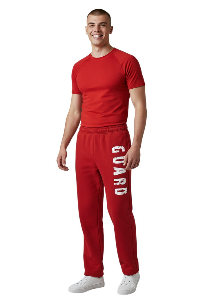 The Lifeguard Store red fleece sweatpants with white "GUARD" logo down the leg. Cotton/polyester blend.