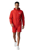 The Lifeguard Store RISE Guard red waterproof polyurethane jacket with full zip, adjustable hood, and "GUARD" lettering on chest.