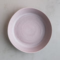 Birds eye view of Palinopsia Ceramics Handmade low salad and fruit bowl in neutral grey
