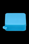 Front-facing close-up of a blue Silicone Square Keychain Stash Container against a solid black background.
