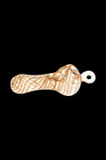 Angled top-down view of the Spiral Beast Pendant Spoon Pipe showing orange spiral filaments in clear glass against a black background.