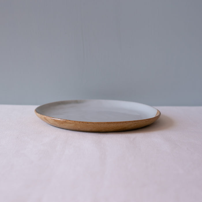 Side view of Palinopsia's handmade lunch and dessert plate