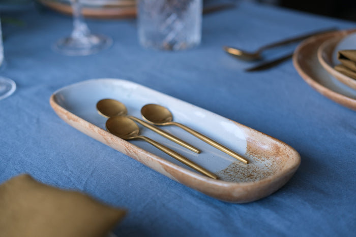 Sideview of a handmade rectangle stoneware dish